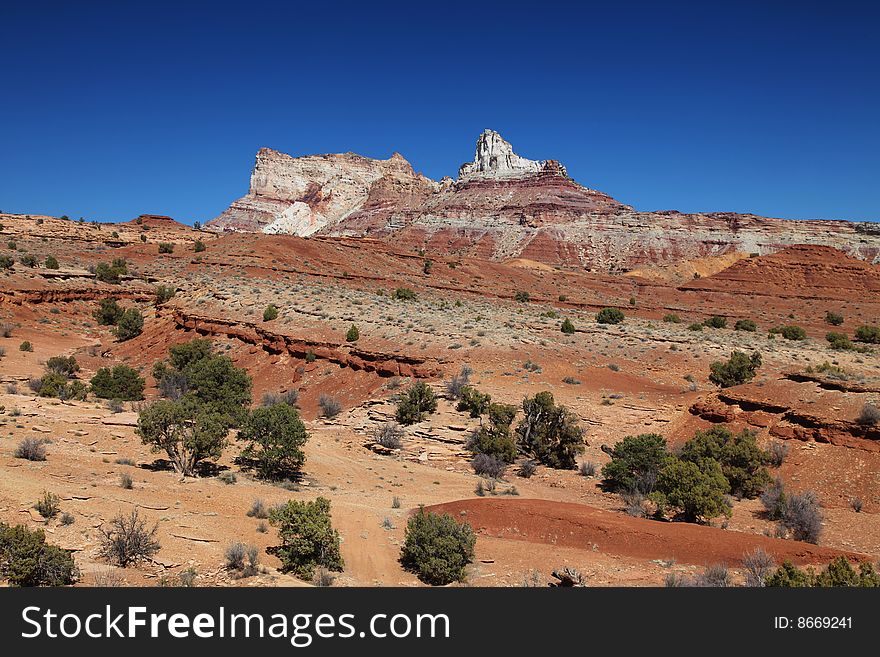 View of red rock formations in San Rafael Swell with blue sky�s