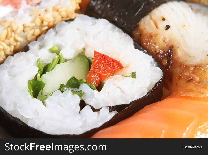 The Japanese meal with rice a fish and sea seaweed.