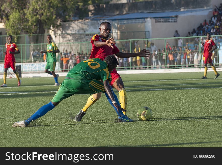 A Heegan player tries to steal the ball from a Horseed player during a game between the two football clubs held at Banadir Stadium on 31st January 2014. AU UN IST PHOTO / David Mutua. A Heegan player tries to steal the ball from a Horseed player during a game between the two football clubs held at Banadir Stadium on 31st January 2014. AU UN IST PHOTO / David Mutua