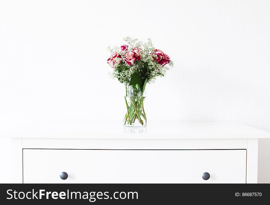 Vase With Red And White Roses