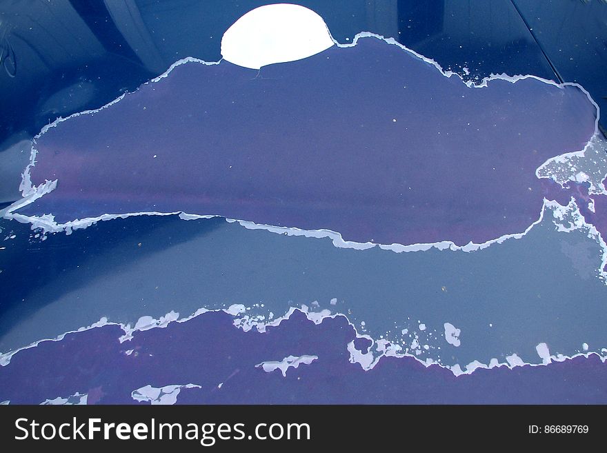 cloud with moon &#x28;peeling paint on car&#x29;