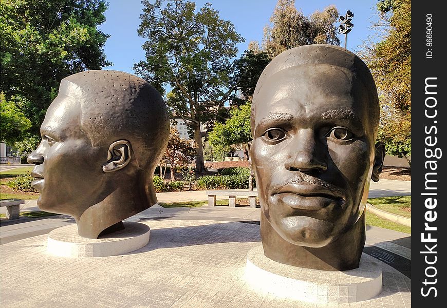 Jackie and Mack Robinson were famous African American athletes from Pasadena, California. These massive bronze busts commemorate them and are on Garfield Avenue in Pasadena, California across the way from City Hall. Day 118 of my 366 Project I have made this a Creative Commons dedication, in deference to the artists. See the link: articles.latimes.com/1997/nov/07/local/me-51230. Jackie and Mack Robinson were famous African American athletes from Pasadena, California. These massive bronze busts commemorate them and are on Garfield Avenue in Pasadena, California across the way from City Hall. Day 118 of my 366 Project I have made this a Creative Commons dedication, in deference to the artists. See the link: articles.latimes.com/1997/nov/07/local/me-51230