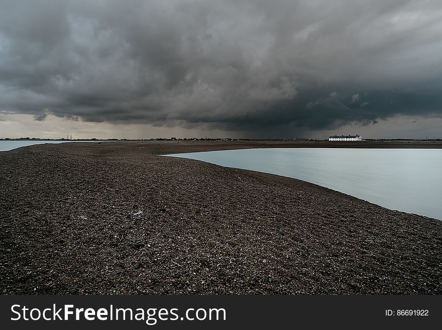 Big skies over Shingle Street in Suffolk, England. Big skies over Shingle Street in Suffolk, England.