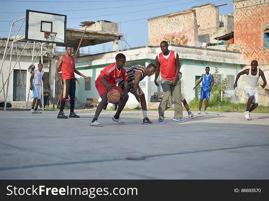 Basketball players play a game on a court in Mogadishu, Somalia, on June 6. Banned under the extremist group, Al Shabaab, Basketball is once again making a resurgence in Mogadishu. Today at least a dozen teams in the city play in a league and both men and women are coming out to play the sport. AU UN IST PHOTO / TOBIN JONES. Basketball players play a game on a court in Mogadishu, Somalia, on June 6. Banned under the extremist group, Al Shabaab, Basketball is once again making a resurgence in Mogadishu. Today at least a dozen teams in the city play in a league and both men and women are coming out to play the sport. AU UN IST PHOTO / TOBIN JONES