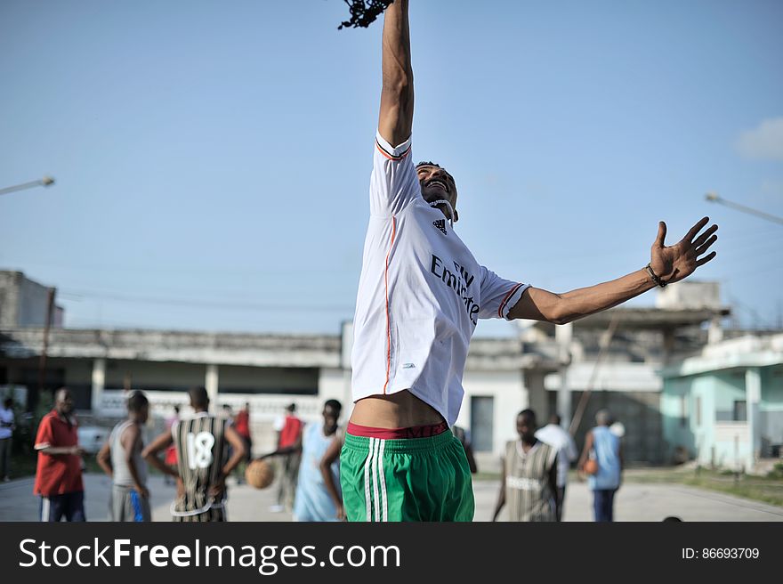 A basketball player in Mogadishu, Somalia, jump up to try and touch the rim during a practice session on June 6. Banned under the extremist group, Al Shabaab, Basketball is once again making a resurgence in Mogadishu. Today at least a dozen teams in the city play in a league and both men and women are coming out to play the sport. AU UN IST PHOTO / TOBIN JONES. A basketball player in Mogadishu, Somalia, jump up to try and touch the rim during a practice session on June 6. Banned under the extremist group, Al Shabaab, Basketball is once again making a resurgence in Mogadishu. Today at least a dozen teams in the city play in a league and both men and women are coming out to play the sport. AU UN IST PHOTO / TOBIN JONES