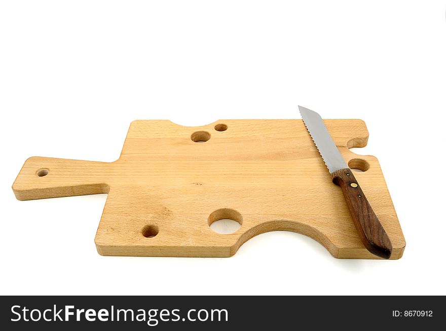 Big chopping board and knife on white background