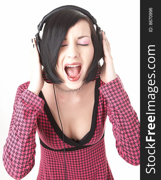 Emo girl in head phones on white background