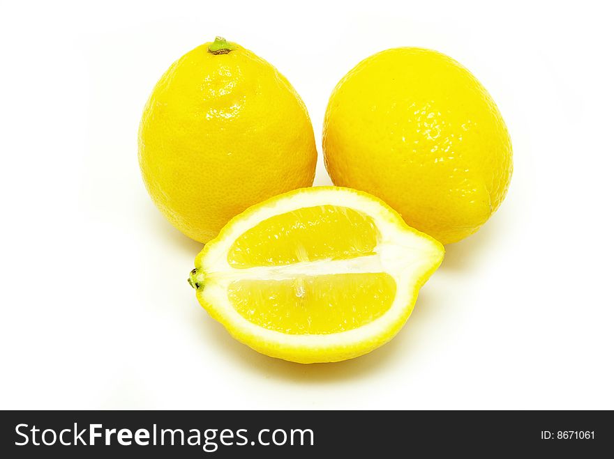 Yellow fresh lemons isolated on a white