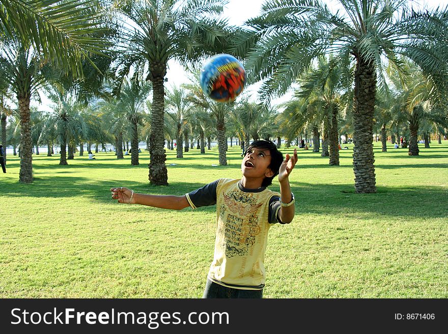 Indian boy enjoying his holidays in the park. Indian boy enjoying his holidays in the park