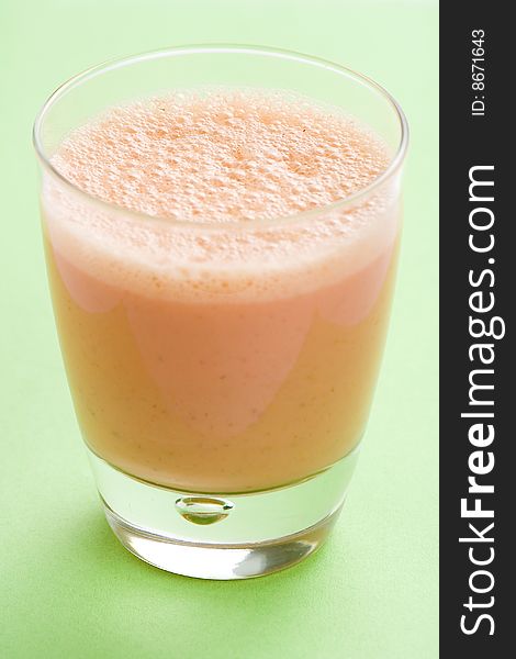 Delicious refreshing strawberry orange banana milkshake natural isolated. Delicious refreshing strawberry orange banana milkshake natural isolated