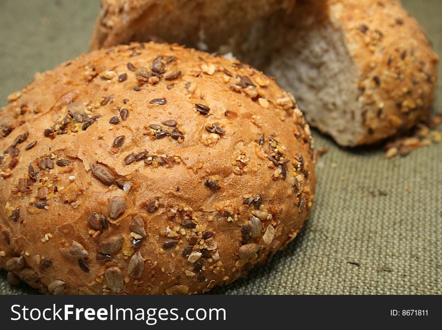 Close-up with dark grain seed bread and grains. Close-up with dark grain seed bread and grains