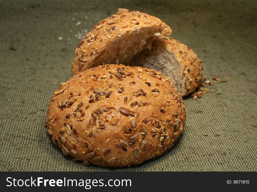 Close-up with dark grain seed bread and grains. Close-up with dark grain seed bread and grains