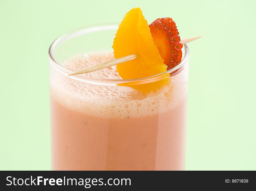 Delicious strawberry orange banana milkshake