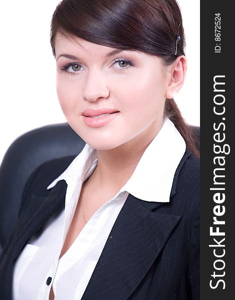 Portrait of young beautiful woman in office environment