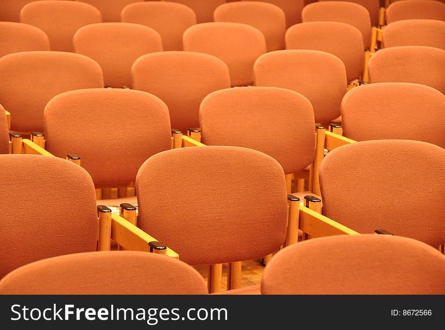 Comfortable chairs in orderly rows. Comfortable chairs in orderly rows