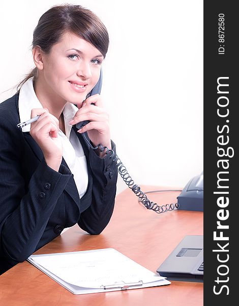 Portrait of young beautiful woman in office environment