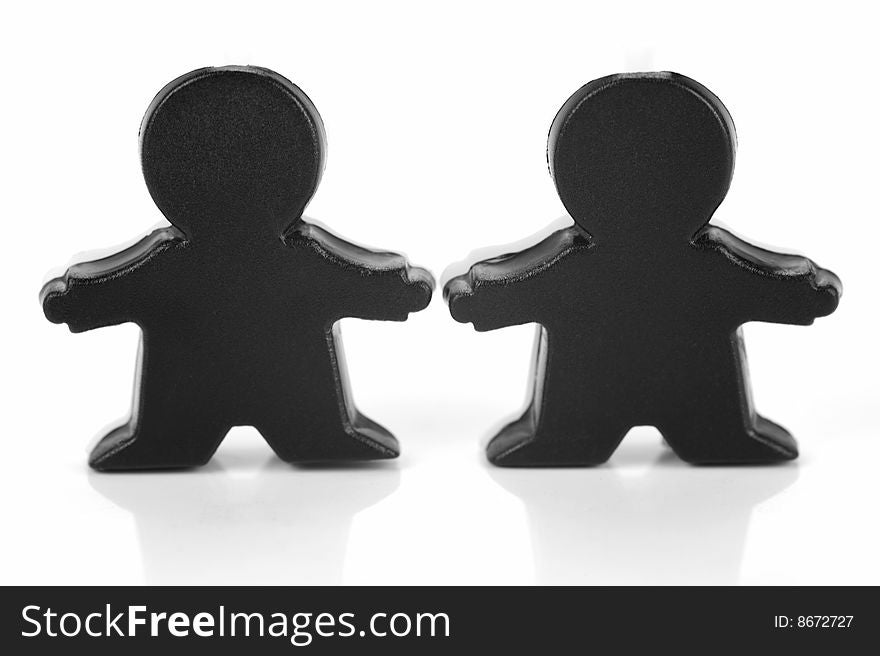 Miniature figurines isolated against a white background