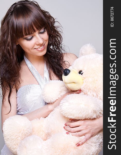 Beautiful Girl With A Teddy Bear