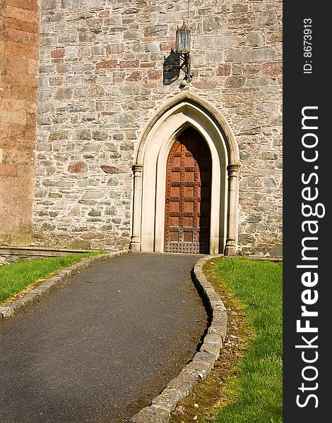 Path leading to a large church door. Path leading to a large church door