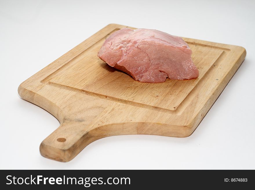 Piece of meat isolated on white background