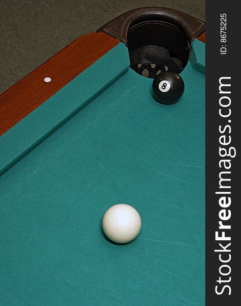 The last shot in a game of billiards.