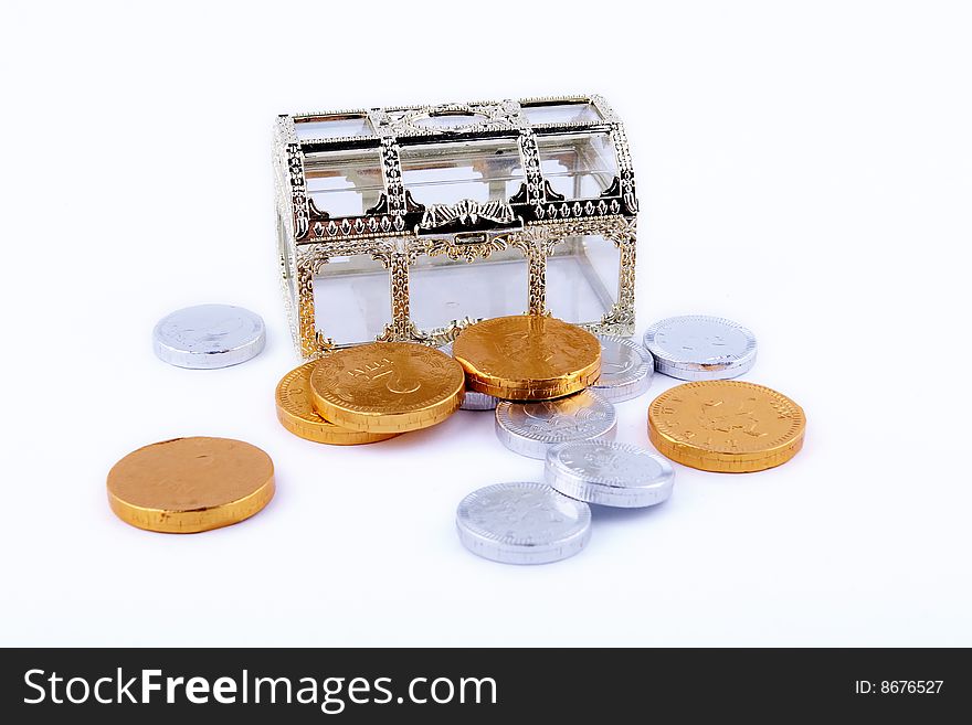 Toy plastic treasure cest and chocolate coins. Toy plastic treasure cest and chocolate coins