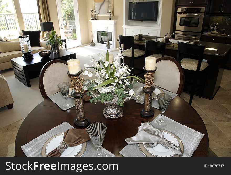 Dining table with modern tableware and decor. Dining table with modern tableware and decor.