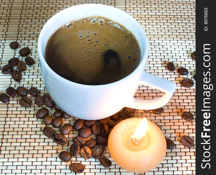 Cup of coffe with candle