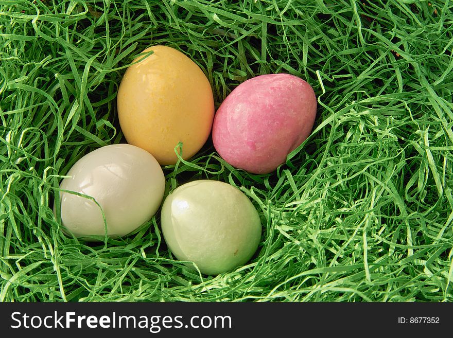 Four Eggs inside a Nest of Grass. Four Eggs inside a Nest of Grass