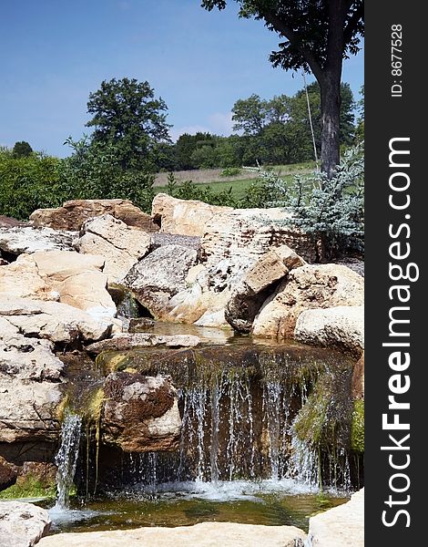 Rural waterfall through rock formation. Rural waterfall through rock formation