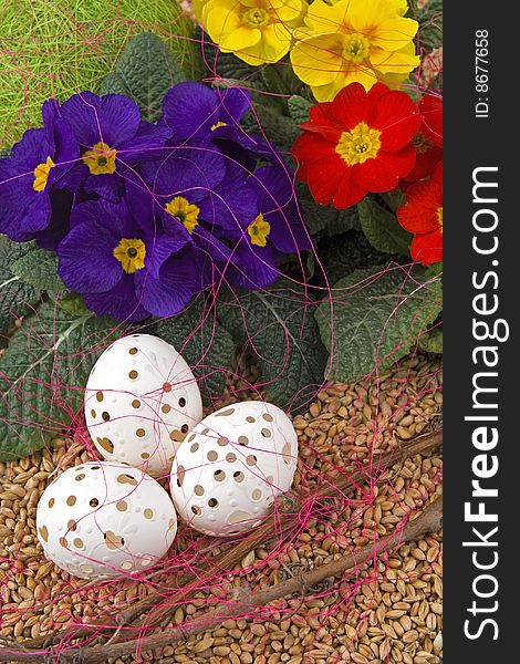 Easter retirement with variance coloured primrose and Easter egg. Easter retirement with variance coloured primrose and Easter egg.