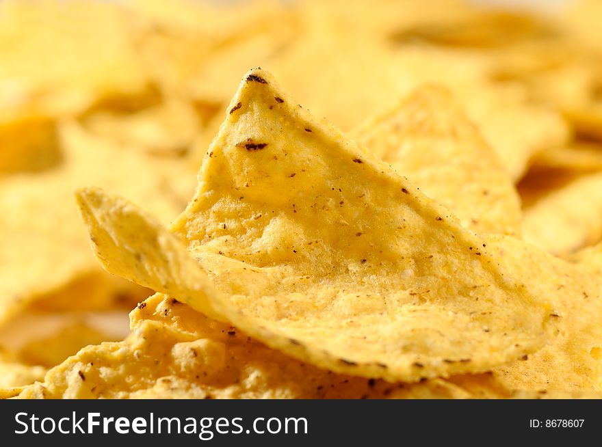 Corn chips in the capacity of background. Corn chips in the capacity of background.