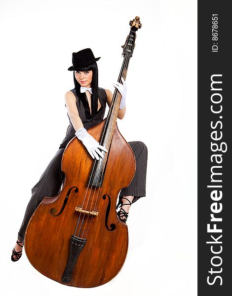 Young beautiful brunette with old contrabass