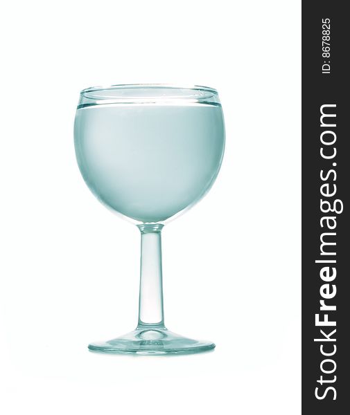 Wineglass full of water on the white background