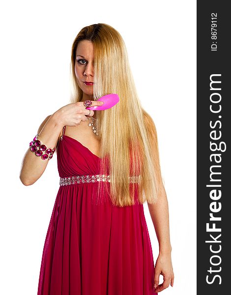 Long hair blonde woman with hairbrush in her hand. Long hair blonde woman with hairbrush in her hand