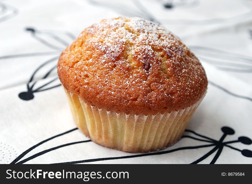 Home baked muffin with raspberry jam