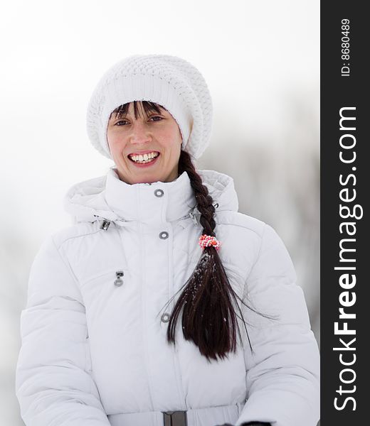 Winter portrait of a happy girl - Shallow DOF. Winter portrait of a happy girl - Shallow DOF