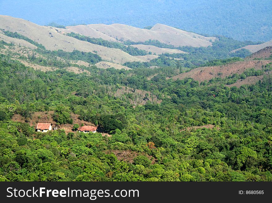 Two houses in the middle of mountainous forest. Two houses in the middle of mountainous forest
