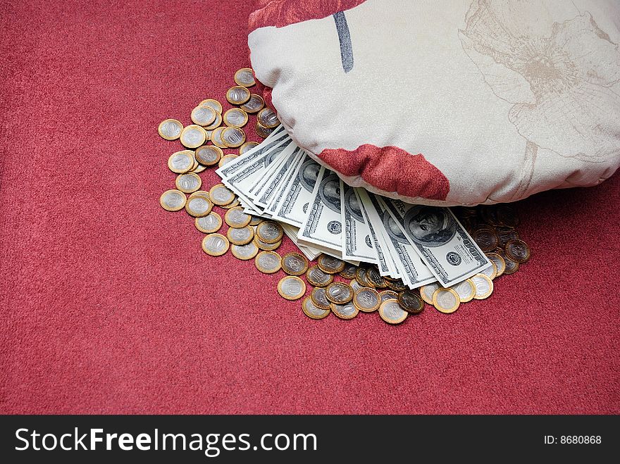 Russian rubles and american dollars are stored under pillow. Russian rubles and american dollars are stored under pillow