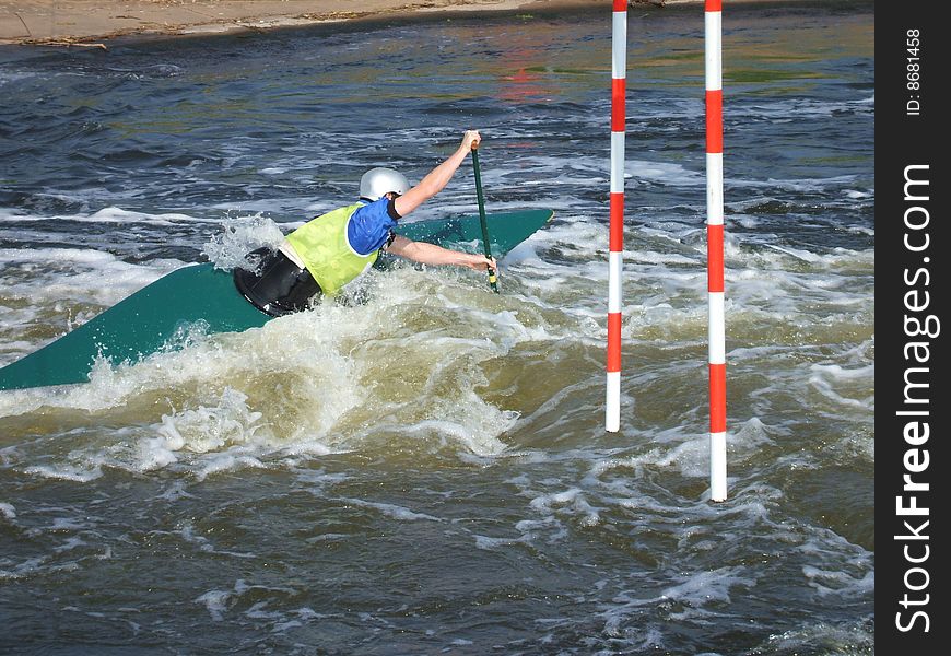 A Canoeist Making a Difficult Turn in the Water. A Canoeist Making a Difficult Turn in the Water.