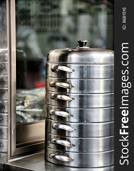 Silver Steel Chinese Bun Pressure Cooker Stacked High. Silver Steel Chinese Bun Pressure Cooker Stacked High