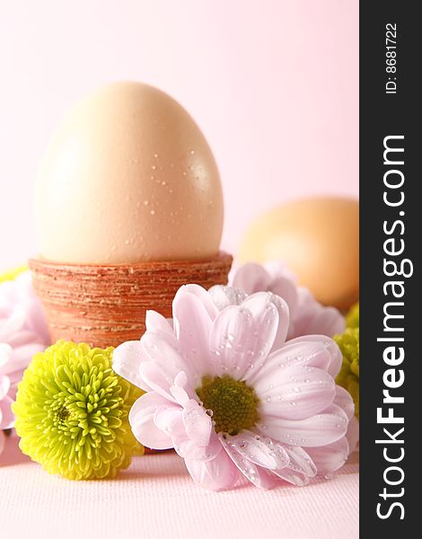 Easter eggs with fresh flowers