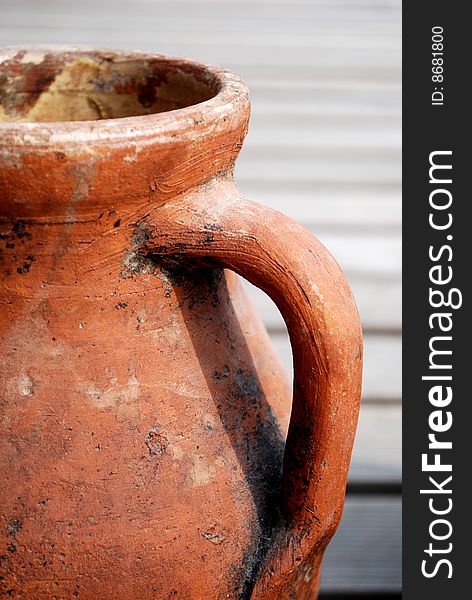 Ancient red amphora handle for beautiful background