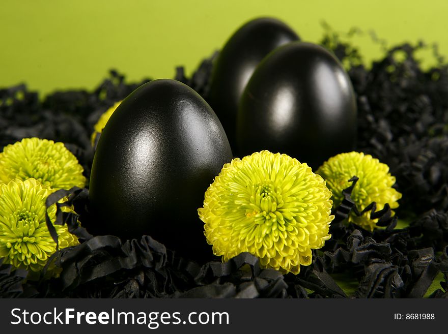 Black easter eggs with flowers