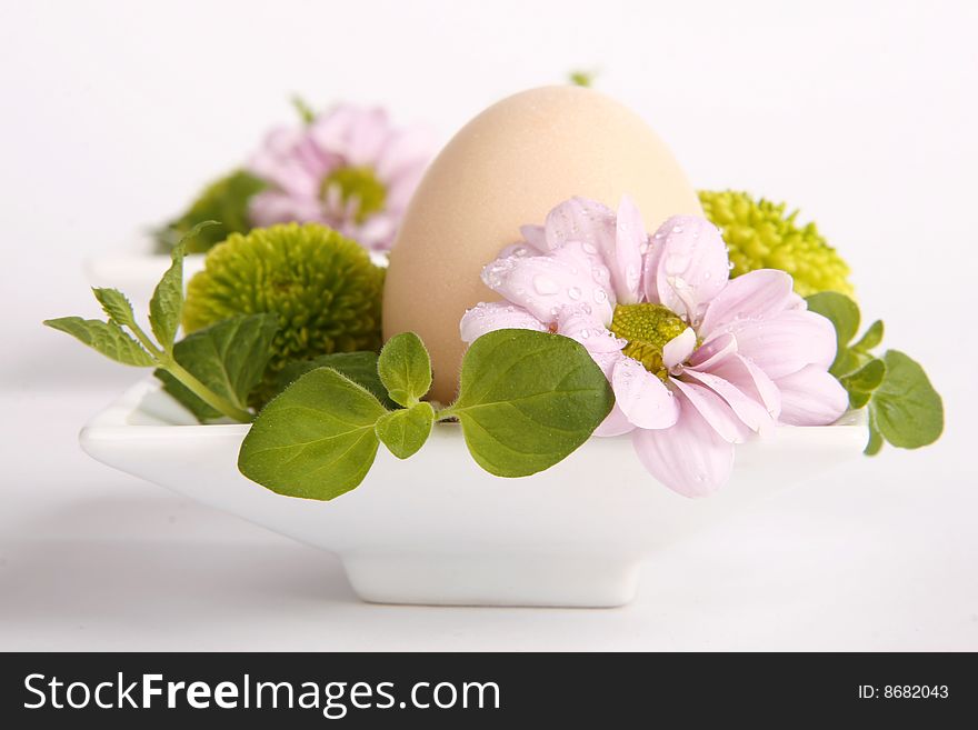 Easter egg with herbs and flowers. Easter egg with herbs and flowers