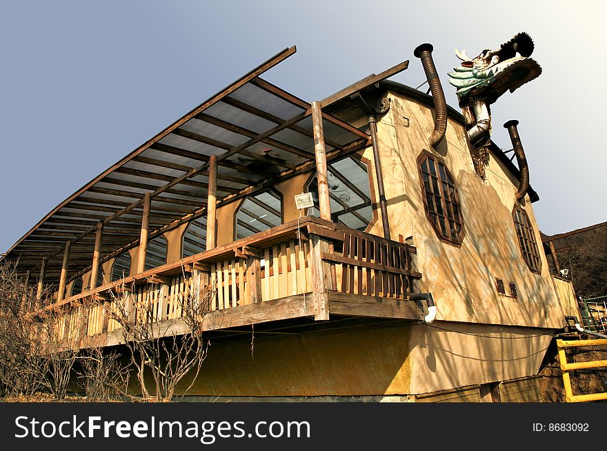 House with Wooden Balcony