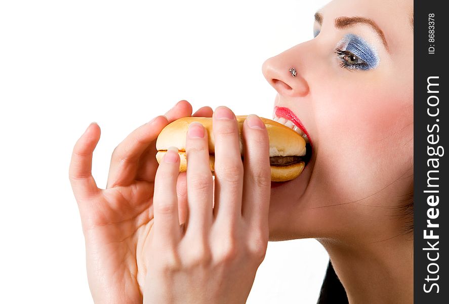 Attractive young lady eating burger. Attractive young lady eating burger