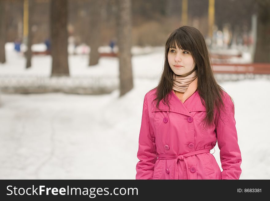 A portrait of sad young woman in the spring park. A portrait of sad young woman in the spring park