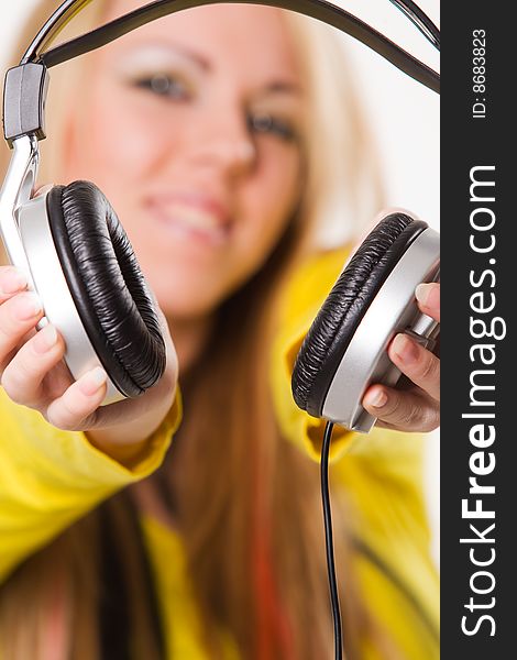 Attractive Young Woman With Headphones Over White