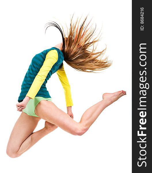 Young attractive blond jumping with hair flying. Young attractive blond jumping with hair flying